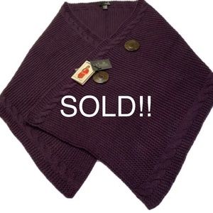 The Davenport Cable Wrap by NOELLE. The color is eggplant, one size fits all NWT
